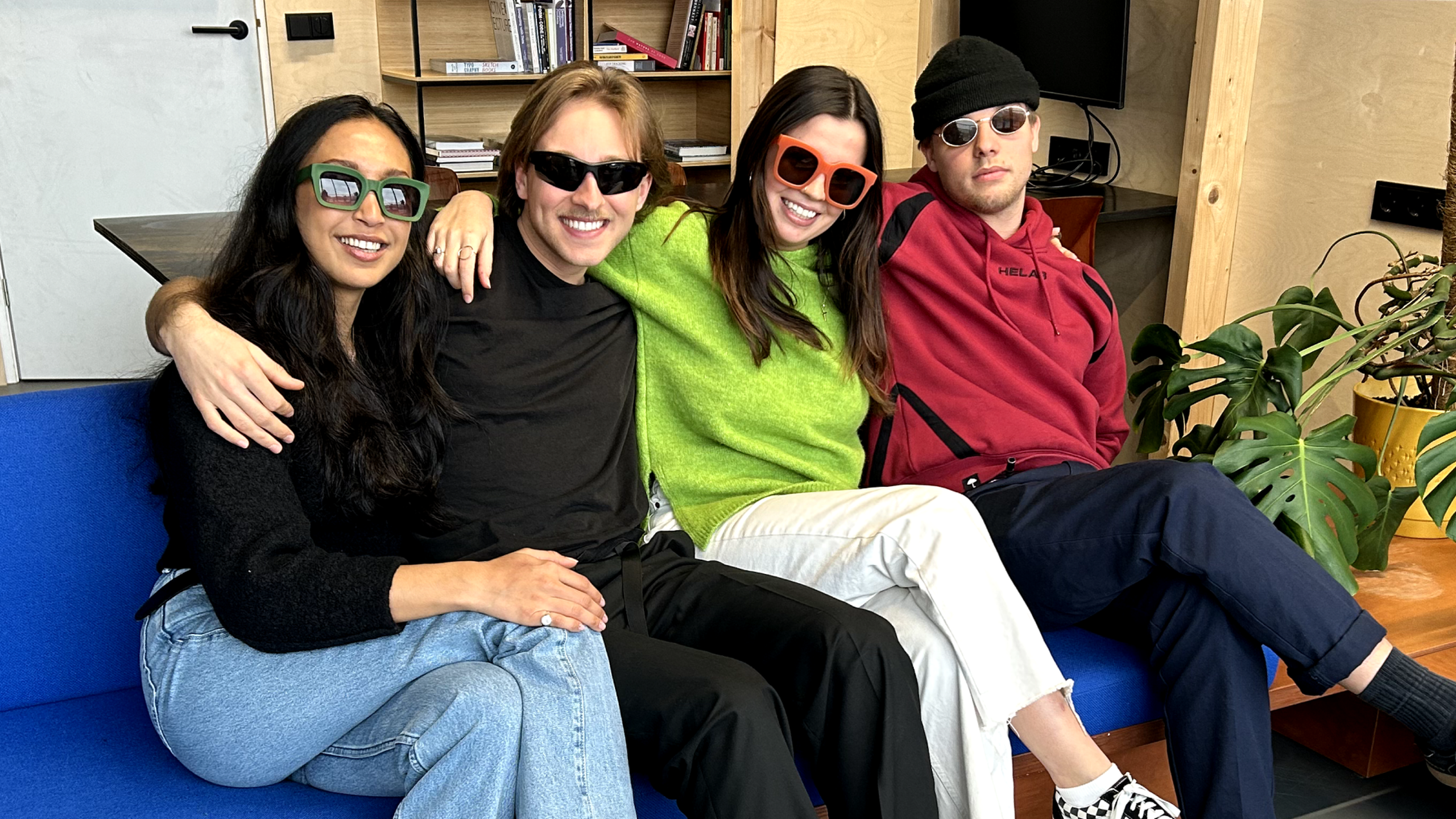 Alana, AJ, Maia and Basile pose with fun sunglasses 